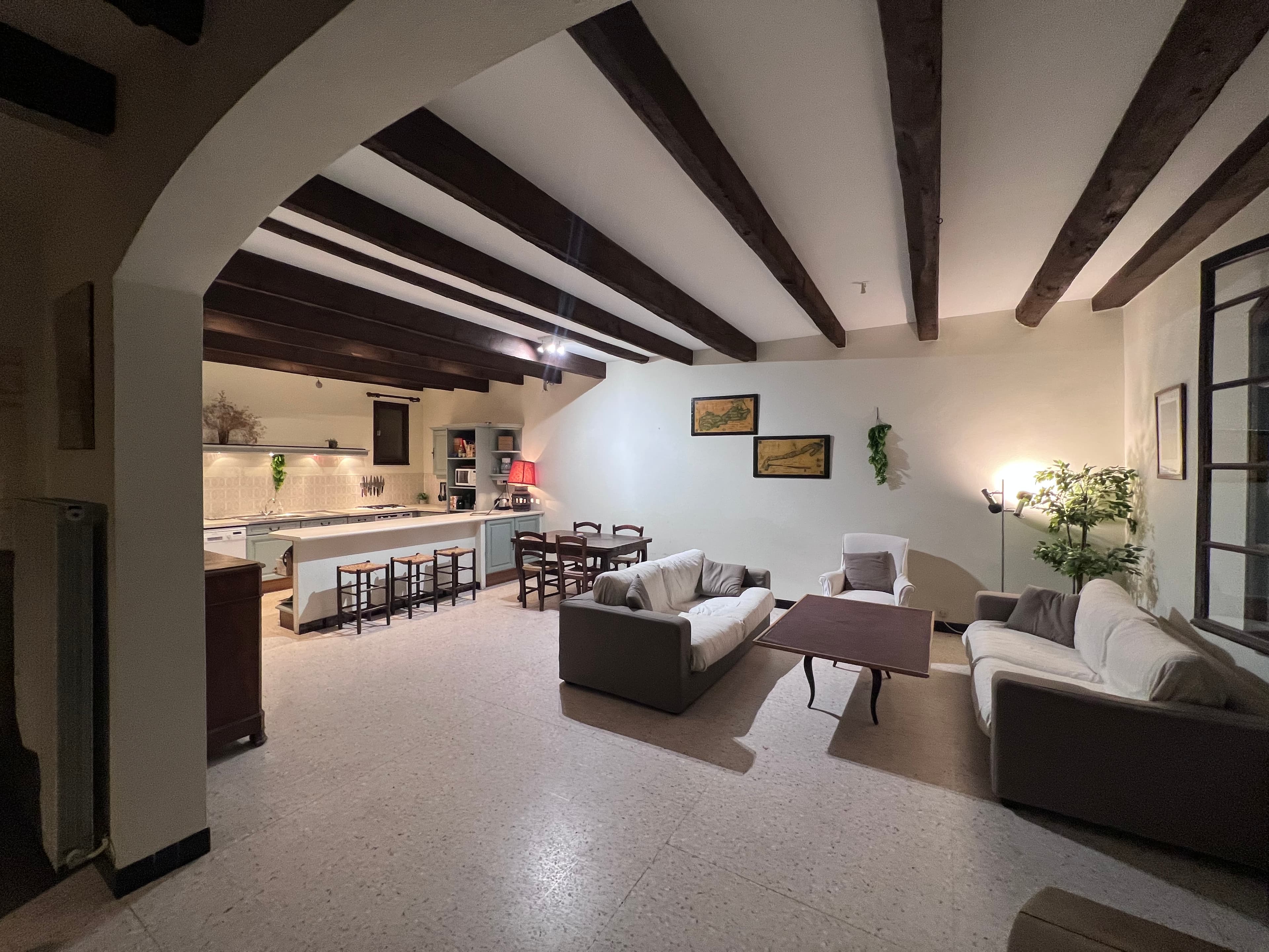 Wide view of the open-plan living, dining and kitchen area